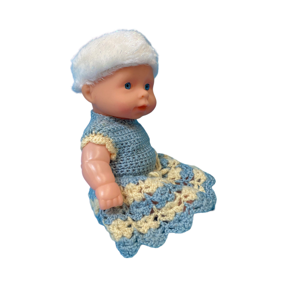Poupée - Robe bleue en tricot