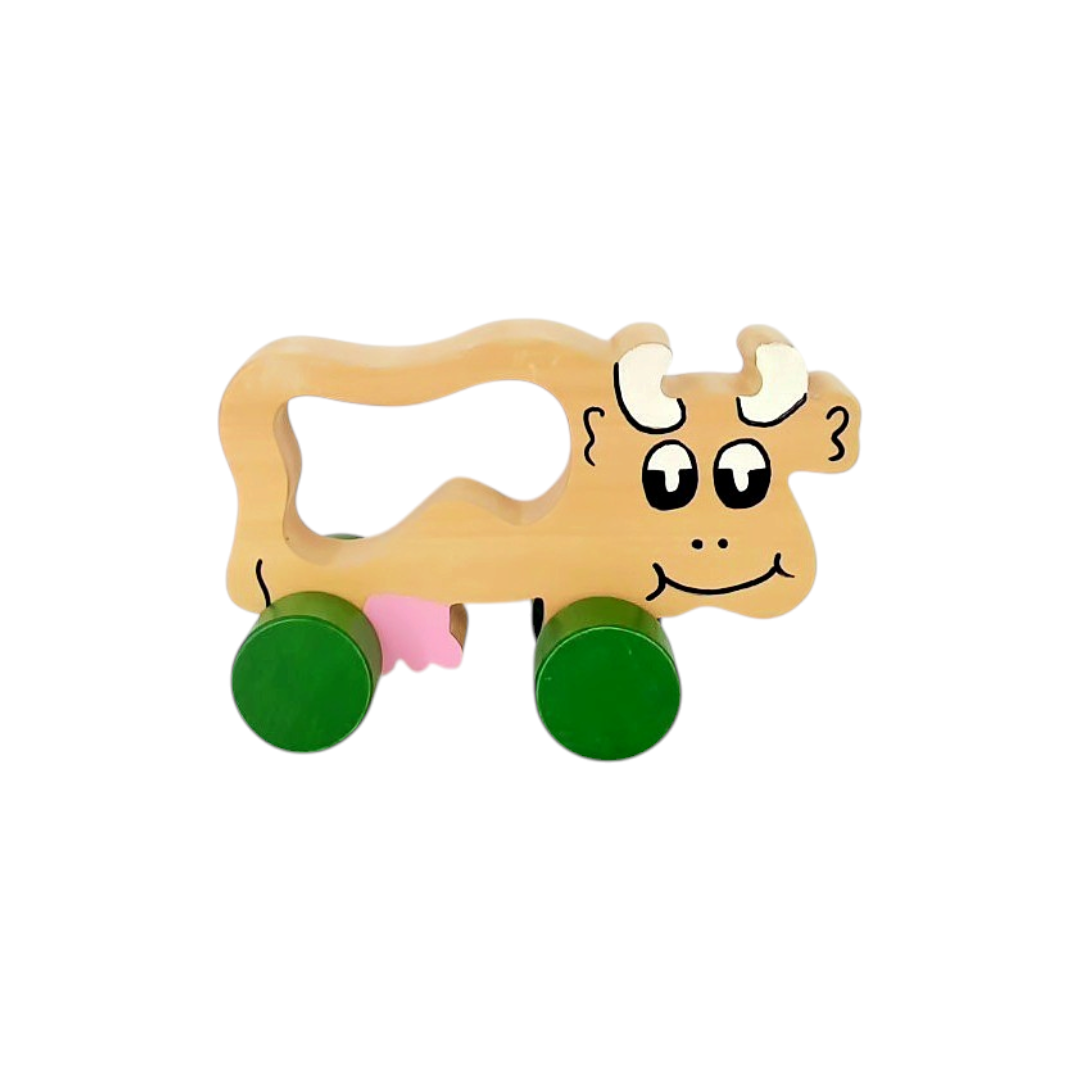 Vache à roulettes en bois