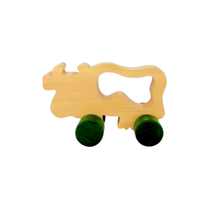 Vache à roulettes en bois