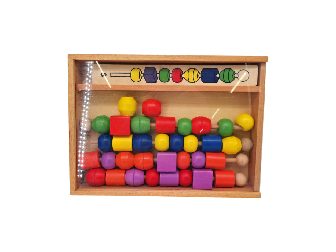 Jeux à enfiler perles ou anneaux sur  tiges