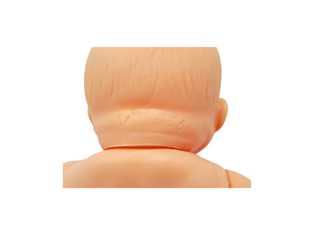 Poupée - Robe rose et verte